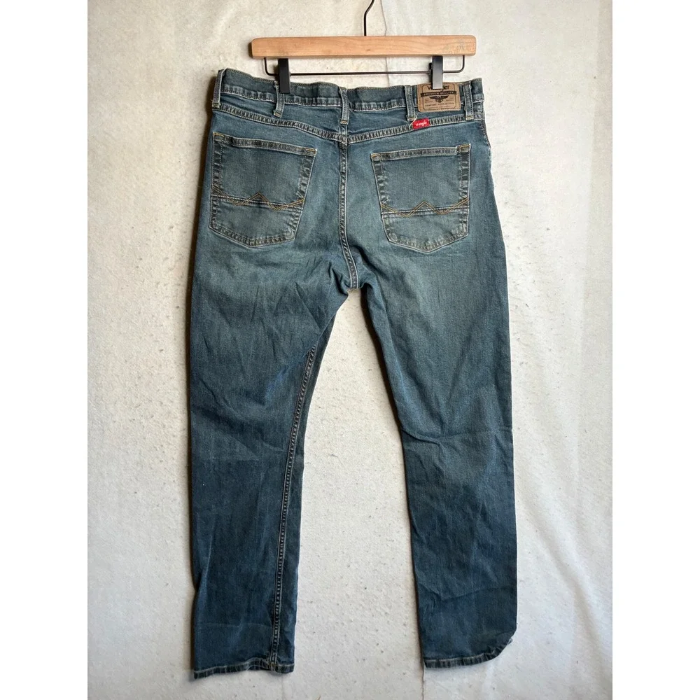 Wrangler Athletic Fit Jeans Mens 34x32 Medium Wash Blue Denim 1090ATWHX